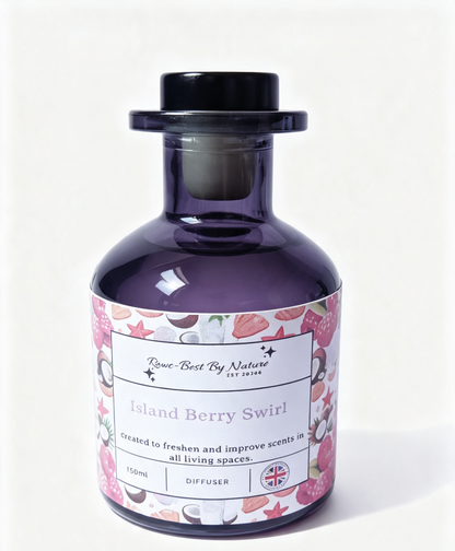 A 150ml glass reed diffuser bottle with a dark black body and a black cap, featuring a white label with pink strawberry illustrations and the scent name 'Island Berry Swirl' by Rowe-best By Nature.