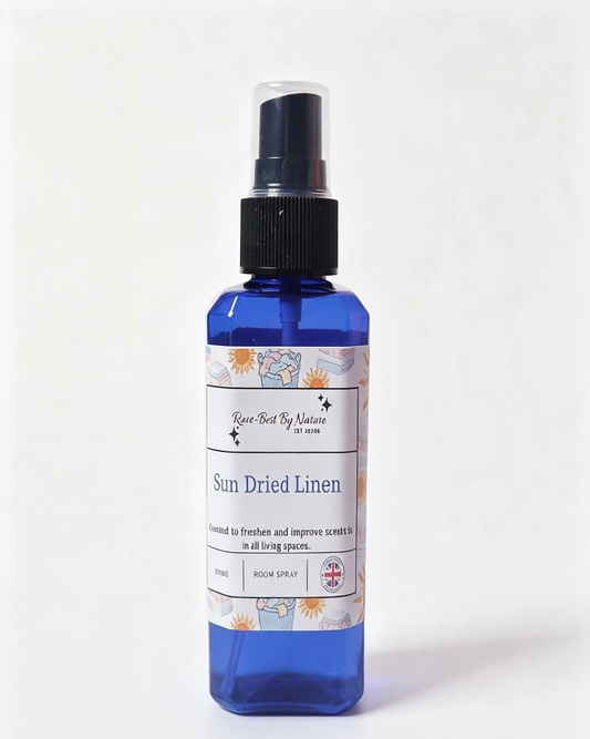 A  blue room spray bottle with a black spray nozzle and a white label reading 'Sun Dried Linen' by 'Rowe-best By Nature', set against a plain white background.
